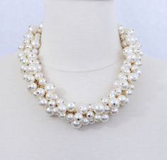 "This beautiful cluster pearl choker/necklace is made of high quality glass pearls in the sizes of 14mm, 12mm and 10mm. The necklace in the listing picture measures 18\" with a 4\" extender. The choker style in the listing picture measures 16\" with a 4\" extender. If you need a different length, please contact us for custom order details. Made of resin and alloy. Lead and nickel free. Our store front: https://www.etsy.com/shop/HelensCollection Orders are shipped within 1-2 business days by USPS Pearl Necklace Ideas, Chunky Pearl Statement Necklace, Diy Pearl Necklace, Chunky Pearls, Bridal Pearl Necklace, Pearl Statement Necklace, Pearls Diy, Necklace Bridal, Necklace Chunky