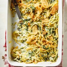 a casserole dish with chicken and broccoli