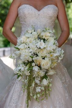 the bride is holding her wedding bouquet and posing for this instagram photo from google