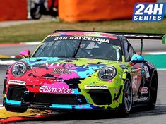 a colorful porsche racing car driving on a race track with the words 24h series written on it