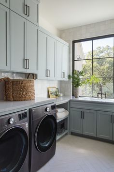 a washer and dryer in a large kitchen