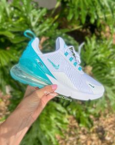 Swarvoski nike blinged air max 270 for women!  Both inner and outer Nike checks blinged and the "AIR" on the backs!  SIZING:  Runs a half size small... or a half size up.  Ex. 8.5 regular orders a 9  COLOR: shown: White/Dusty Cactus/Black/Dusty Cactus All shoes are 100% authentic and purchased through Nike or an authorized dealer such as: Finish line, Champs, Footlocker.   IMPORTANTPlease allow 2-3 weeks at the latest for your shoes to be completed and shipped, these are made to order  All Sales 270 Nike Shoes Purple, Nike Shoes Women Air Max 270 Blue, Girly Crocs, 270 Air Max Shoes, 270 Nike Shoes, Sneaker Wishlist, Air Maxes, Womens Nike Air Max 270, Nike Airmax 270