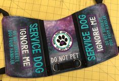 there is a dog tag attached to the back of a bag that says service me do not pet