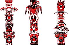 three totems with red and black designs on them