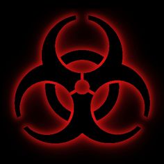 a red and black biohazard symbol on a black background