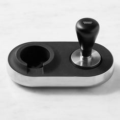 a black and white photo of a game controller