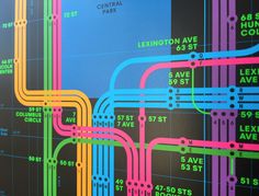 a colorful subway map is shown on the wall