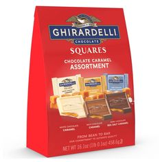 ghirardell chocolate squares assortment in a red paper bag on a white background