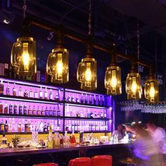 Rustic Bar Ceiling Clear Glass Beer Mug Pendant Light In Bronze With Water Pipe Design 6 / Bar Lights Ceiling, Ceiling Hanging Lights Bar, Bottle Ceiling Lights, Beer Can String Lights, Brewery Interior Design, Brewery Interior, Restaurant Design Rustic, Beer Decorations, Bar Island