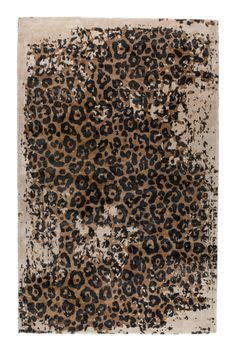 an animal print rug on a white background