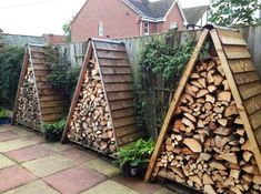 several stacks of firewood stacked on top of each other