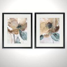 two framed art pieces with flowers on them