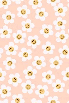 a pink background with white flowers and smiley faces