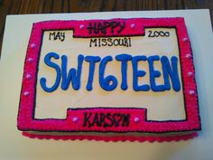 a sheet cake with the words happy missoui written in blue and pink frosting