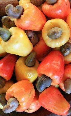 a bowl filled with lots of different types of fruits and veggies on top of each other