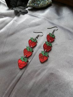 "Red marble strawberries with painted details. These are approximately 1.75  inches in length and lightweight! Jewelry hooks are stainless steel. Leverbacks are available by request in the \"notes\" section of check out. Thanks for looking! :)" Marble Strawberries, Alternative Earrings, Recruitment Themes, Jewelry Hooks, Red Marble, Laser Cut Earrings, Spring Earrings, Light Weight Jewelry, Earrings Handmade Dangle