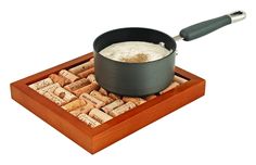 a pan filled with wine corks on top of a wooden tray