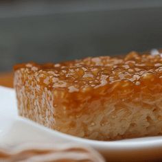 a piece of cake sitting on top of a white plate