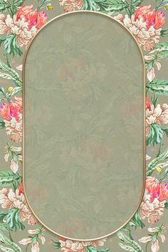 an ornate frame with pink flowers and green leaves on a beige wallpapered background