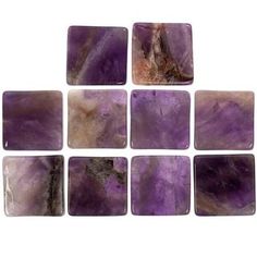 six square purple marble tiles with different colors and designs on them, set against a white background