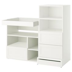 a white bookcase with drawers and shelves