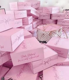 many pink boxes are stacked on top of each other