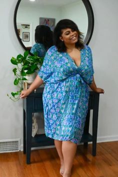 Print: Octavia, Colorway: Majorelle, Size: One size comfortably fits most, 45" Length, Fabric: 10% Cashmere 90% Modal, Shop: https://www.furkatandrobbie.com/collections/lounge/products/the-akila-kimono-wrap-dress-octavia-majorelle Bohemian Wrap Dress With Tie Waist For Vacation, Flowy V-neck Midi Dress For Loungewear, Bohemian Wrap Dress With Surplice Neckline For Vacation, Bohemian V-neck Wrap Dress For Vacation, Bohemian Flowy Wrap Dress With Surplice Neckline, V-neck Viscose Dresses For Loungewear, Spring Loungewear Dress With Kimono Sleeves, Bohemian Wrap Dress For Day Out, Bohemian Wrap Dress For Beach