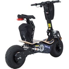 an electric scooter with two wheels and a seat on the front is shown