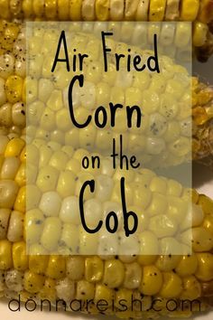 an air fried corn on the cob is shown with text overlay that reads, air fried corn on the cob