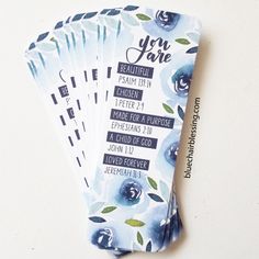 four tickets with blue flowers on them that say you are beautiful