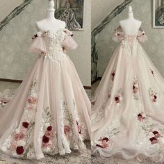 wedding dress with flowers on it and off the shoulder