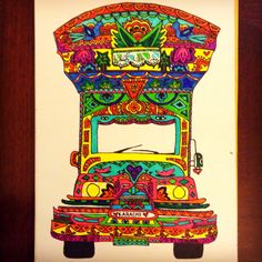 a drawing of a colorful truck on white paper