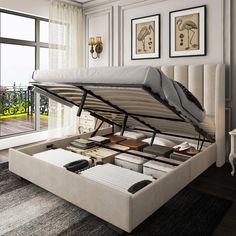 a bed that is sitting in the middle of a room with a mattress on top of it