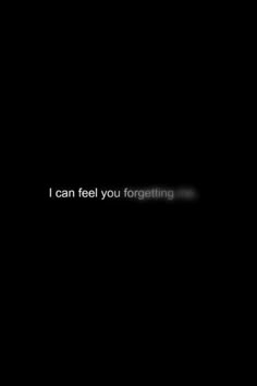 the words i can feel you forgeting are lit up against a dark black background