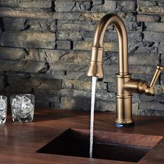 Inspired by the spirit of the industrial revolution, the Artesso Kitchen Collection by Brizo is a blend of beauty, sophistication, and artisan craftsmanship. It is a wide collection of alluring, exceptional kitchen faucets optimized for beneficial use. An example of which is the 64025LF-GL pulldown faucet. This single-handle faucet is made from high-quality materials that assure you durability and functionality. Its spout can be rotated up to 360-degrees which is very user-friendly and makes cleaning a lot easier. The wand has 2 functions that you can choose from either aerated stream or spray options.To turn the water on and off, simply touch the faucet anywhere on the body or on the handle. This is an efficient way to conserve water and save money thanks to its SmartTouch technology. Thi Ways To Conserve Water, Entertaining Tips, Bar Prep, Kitchen Fixture, Landscaping Tools, Corner Tub, Kitchen Company, Rustic Bar, Commercial Bathroom Sinks