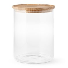 an empty glass jar with wooden lid