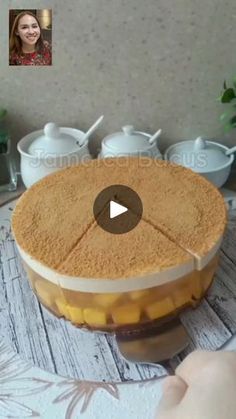 a cake is shown with a video playing on it