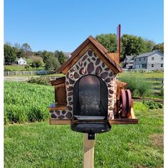 a mailbox in the shape of a giraffe