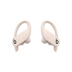 two white earphones sitting side by side on top of each other in front of a white background