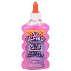 a bottle of cleaner with pink liquid on the top and an orange cap is shown