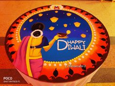 a decorated birthday cake with the name happy diwali on it