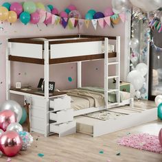 there is a bunk bed in the room with balloons