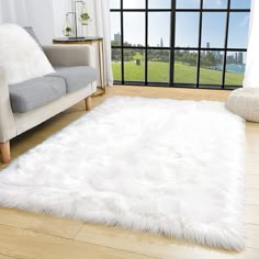 PRICES MAY VARY. 🐑【Faux Fur Rug with Material】The white area rugs are made of premium durable faux sheepskin fur, extra thick and soft-touch features our carpet the superior fluffy hand-feel. Friendly to any age people or pets, no stimulation. 🐑【Non-slip Backing】Slip-resistant suede leather is used for the bottom side with great sewing, keeping the fuzzy rug fastened to the floor. It guarantees both stability and beauty. 🐑【 Perfect Size 】TENNOLA faux sheepskin rug is approx 36in x 59in, perfe Nursery Room Luxury, Fuzzy White Rug, Rug Fuzzy, White Fluffy Rug, Luxury Room Decor, White Faux Fur Rug, Comfy Rugs, Area Rugs For Bedroom, Rug Fluffy