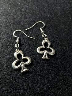 Add a touch of elegance and playfulness to your style with our .995 Sterling Silver Poker-Suit Club Earrings. Expertly crafted from genuine .995 sterling silver, these earrings feature the iconic club symbol, representing luck, prosperity, and a love for the game. Designed with meticulous attention to detail, these earrings showcase a sleek and polished finish, making them a versatile accessory for any outfit. Whether you're a poker enthusiast, a lover of unique jewelry, or simply looking for a Silver Symbolic Hypoallergenic Earrings, Silver Hypoallergenic Symbolic Earrings, Cadmium-free Classic Silver Jewelry, Classic Hypoallergenic Jewelry For Party, Club Symbol, Club Earrings, Ears Pierced, Naples Fl, Naples