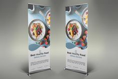 two roll up banners with food on them