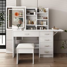 a white desk with a mirror, stool and shelves on it in front of a window