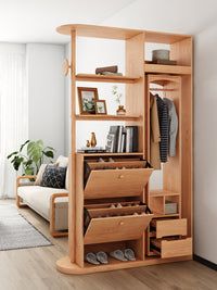 a living room filled with furniture and lots of storage