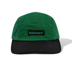 a green and black hat with the name nabenara on it