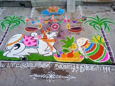 a colorful painting on the ground in front of a building with trees and flowers painted on it