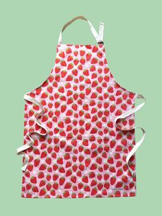 an apron with strawberries printed on it